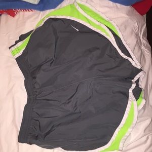 NIKE army and neon green running shorts